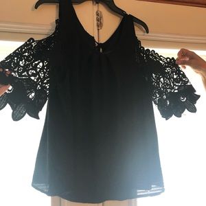 Blouse fits like a Large.